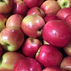 Close up of red apples in a pile